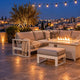Cosy winter rooftop terrace in Amman with lounge set, gas fire pit table and electric patio heater